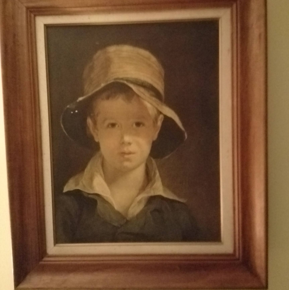 The boy with the torn hat